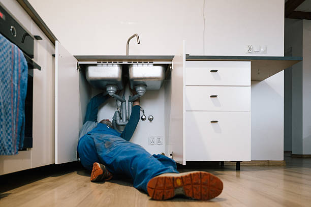 Professional Plumbing technician working in Redmond, WA